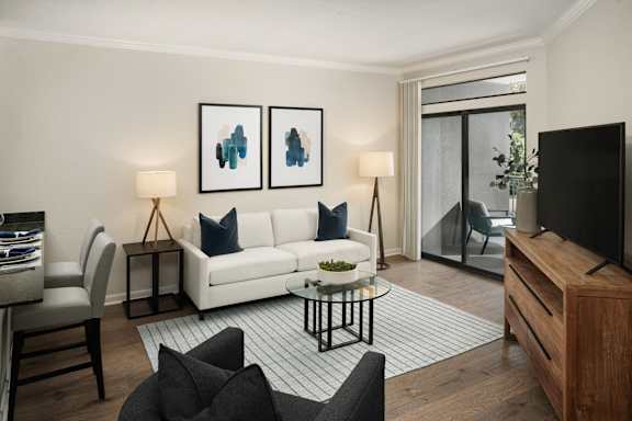 a living room with a couch and a coffee table at AVE Clifton