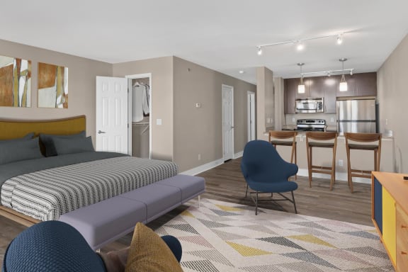 a bedroom with a bed and a chair in a room