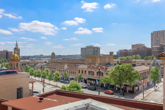 a view of the city from the roof of a building