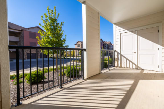 the preserve at ballantyne commons apartments balcony and garage door at The Residences at Bluhawk Apartment Homes, Overland Park, 66085