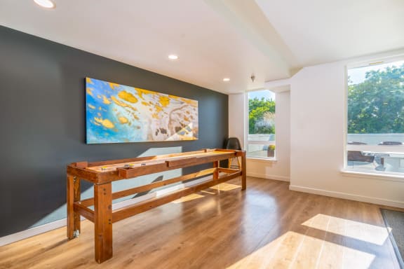 shuffle board table inside indoor lounge