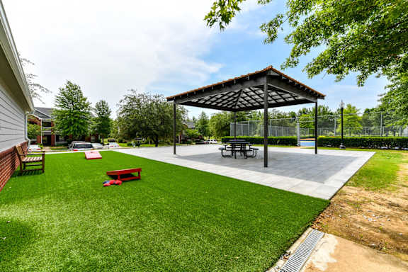 A park with a pavilion and picnic tables. at Park at Forest Hill Apartments, Tennessee