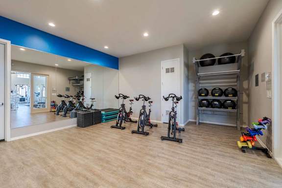 A room with exercise equipment and storage. at Vistoria At Marley Park Apartments, Arizona