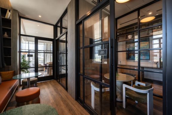 a room filled with furniture and a large window