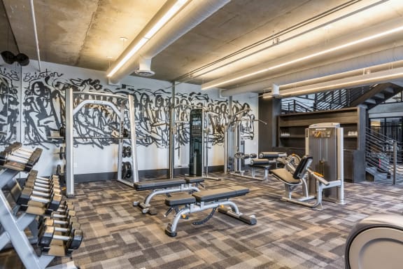 gym with excercise equipments at The Case Building in Dallas, TX