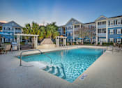 Thumbnail 20 of 26 - Swimming Pool at Magnolia Village Apartments, Jacksonville, FL, 32207
