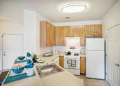 Thumbnail 12 of 40 - Fully Furnished Kitchen at The Apartments at Cambridge Court, Rosedale, Maryland
