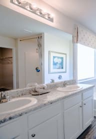 a bathroom with a bathtub and a sink