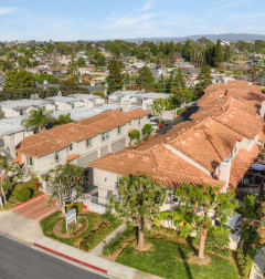 an aerial view of the property and surrounding neighborhood