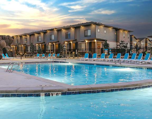Group of children playing in a swimming pool at H2O Townhomes, West Valley City, UT, 84119