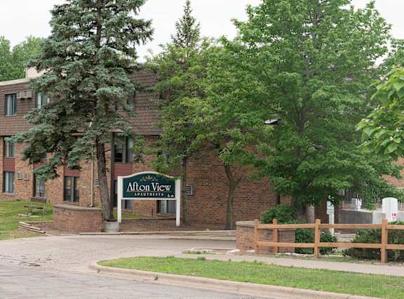 A sign that says "Alton View" in front of a building.