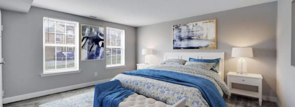 a living room with a couch and two chairs  at Chestnut Hill Village, Philadelphia, PA