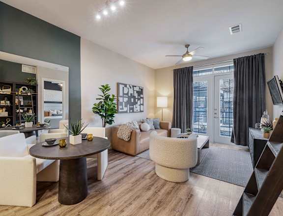 a living room with a couch and a table