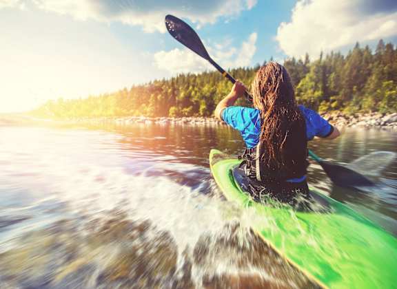 Sagecliff Apartments Woman Kayaking in River