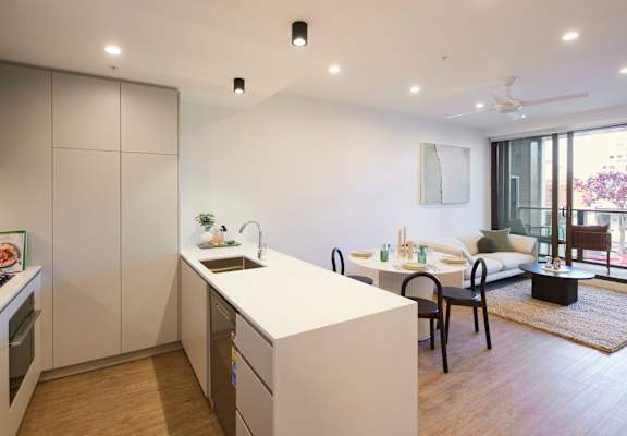 A kitchen and living room 