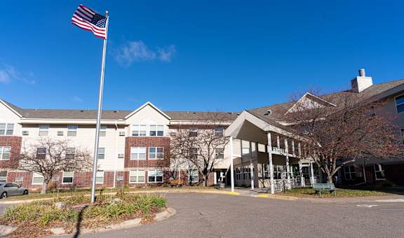 an flag flying in front of a building
