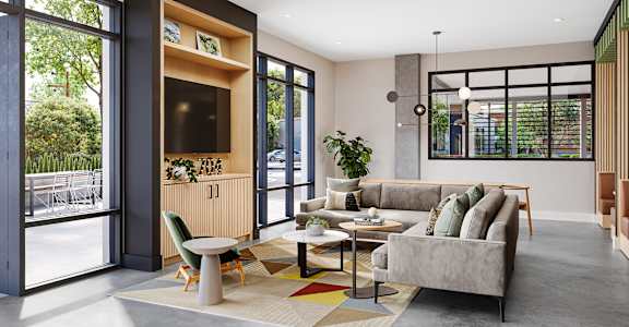 a living room with a couch and a table at Link Apartments® CYKEL Apartments, Charlotte , NC