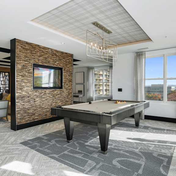 a billiards table in a lobby of a building