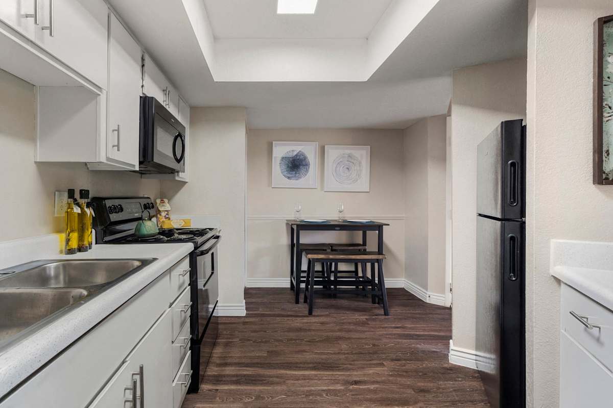 Apartment kitchen — representative home at The Place at Wickertree.