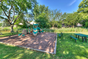 playground and picnic area on the Eagle Creek Apartments property in Westmont, IL