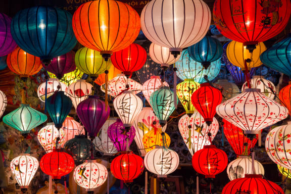 a close up of a bunch of colorful paper lanterns