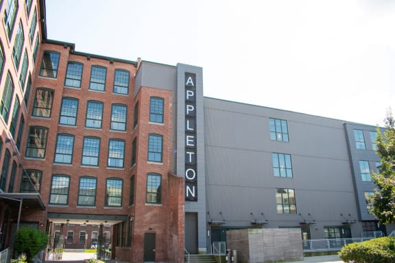 a large building with a sign on the side of it