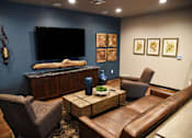 Thumbnail 40 of 53 - Club Room With Large Screen Television at The Brix Apartments, Spokane Valley, WA