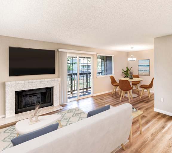 A living room with a fireplace and a couch.
