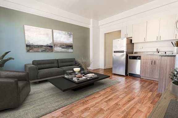 A modern living room with a grey sofa and a coffee table.