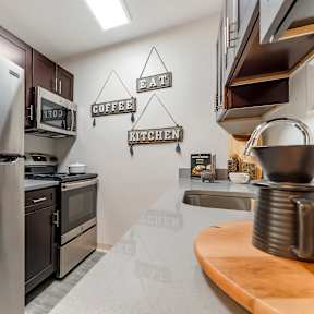 Kitchen with cabinets at The Glover House Apartments, District of Columbia