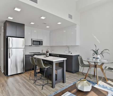 Living Area With Kitchen View at 1405 Point, Baltimore, Maryland