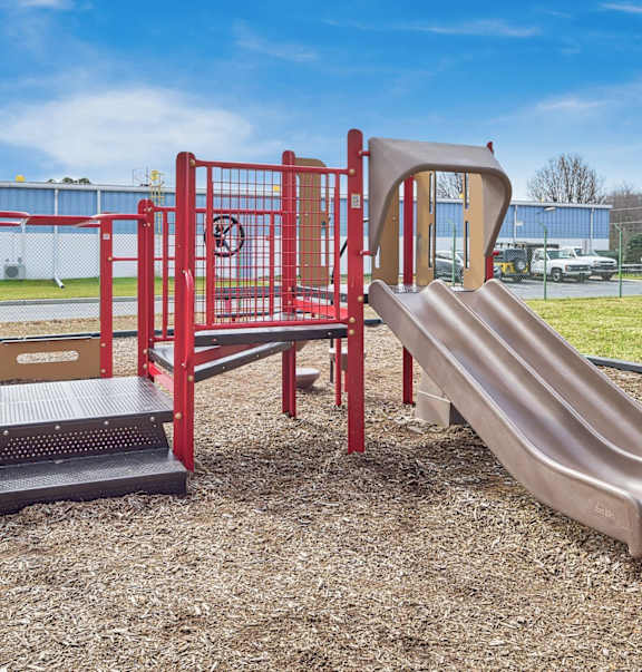 a slide on a playground at a school