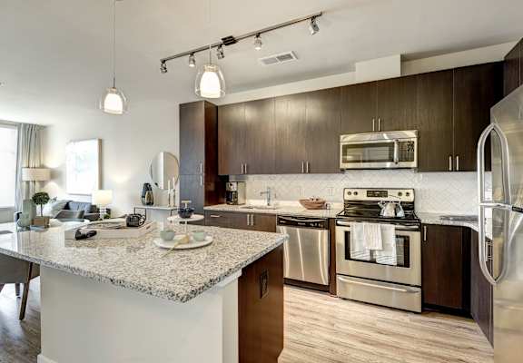 Kitchen with cabinets at Highgate at the Mile, McLean