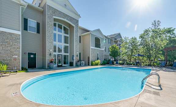 the preserve at ballantyne commons community swimming pool with apartment buildings