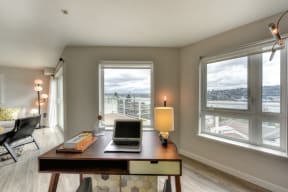 Office Area with Desk, Laptop, Windows and Hardwood Inspired Floor