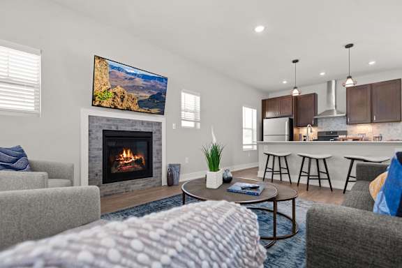 Living room at Quarry Apartments and Townhomes in DeWitt, Michigan