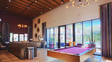 Shared game room at Audere Apartments.