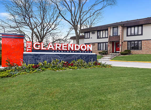 The Clarendon sign is in front of a building.