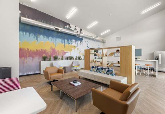 a living room with couches and chairs and a table at SECOND AVE COMMONS | BRAND-NEW, Mesa, Arizona