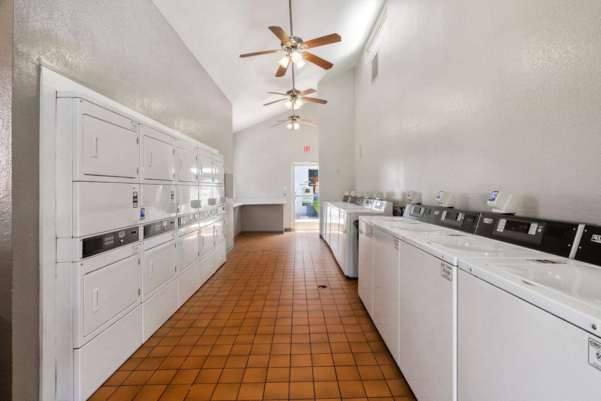 Shared laundry room at West 35th Apartments.