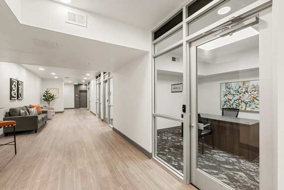 Professional office space with glass entry doors at Lucero Apartments, Phoenix, 85051