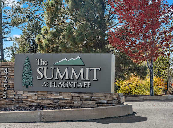 A Wooden Deck With a Sofa at The Summit at Flagstaff, Arizona, 86004