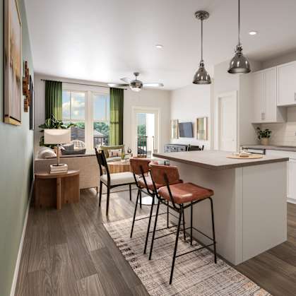 A modern kitchen with white cabinets and a large island.