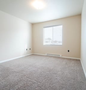 Carpeted Bedroom at Quadrangle 2 Apartments, Spokane, Washington
