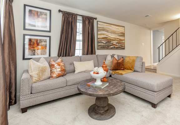 Spacious living room with plenty of light at Spring Hill Townhomes