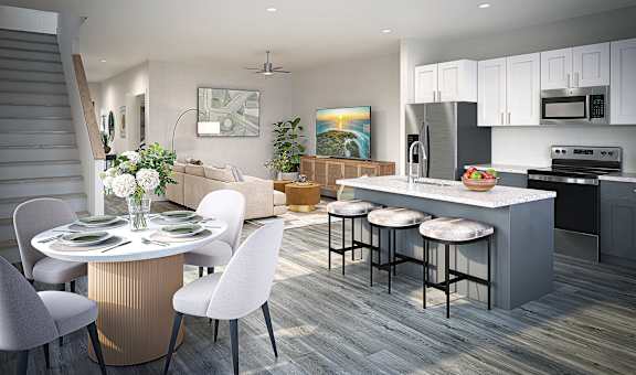 A modern kitchen with a dining table set for four.