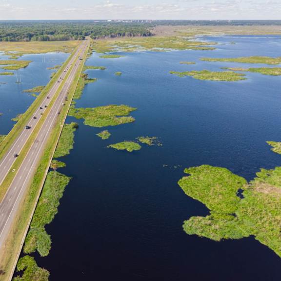 A long bridge spans a body of water.