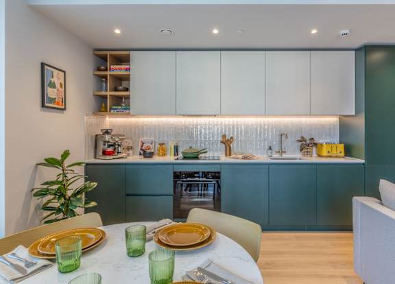 Kitchen and dining area in 2 bedroom apartment at The Maple.