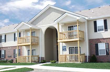 a building with two balconies on the side of it