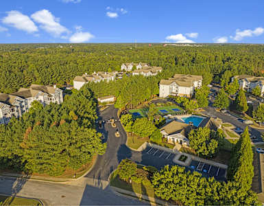 a aerial view of a neighborhood with houses and trees